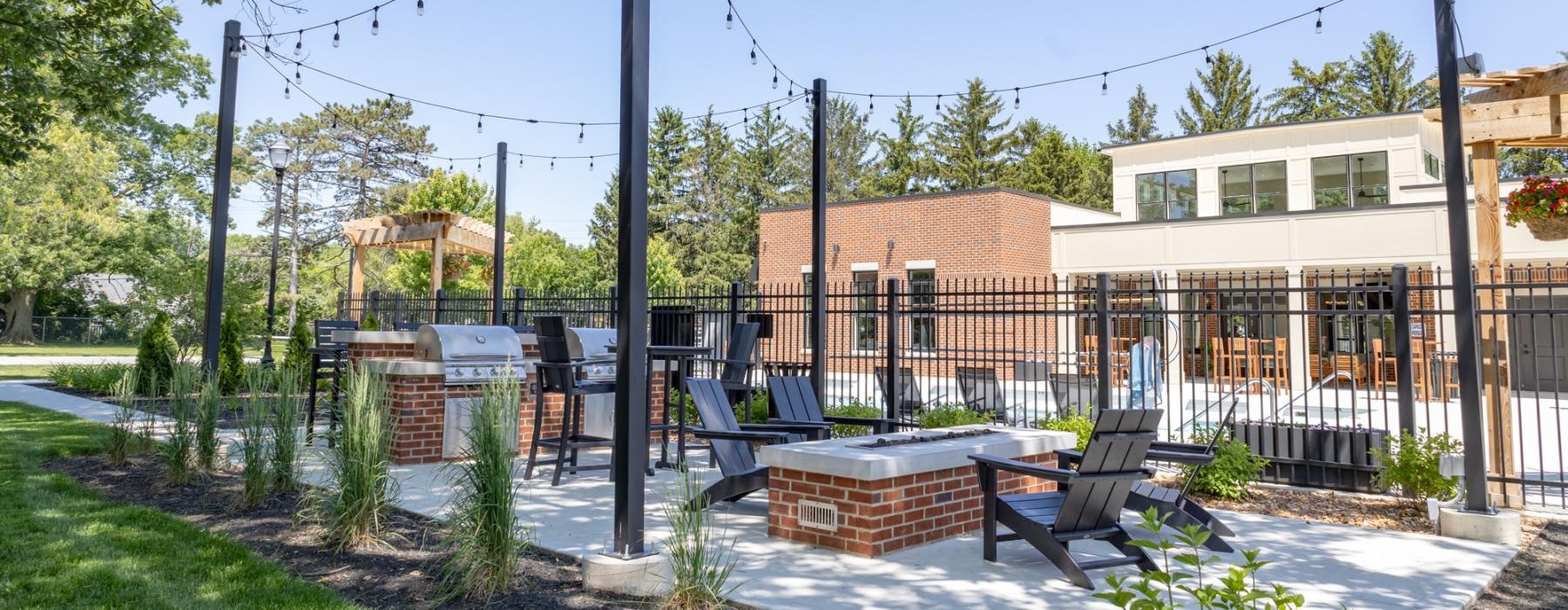 a yard with a grill