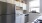 a kitchen with white cabinets