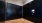 a room with black lockers
