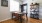 a dining room with a table and chairs