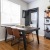 a dining room with a table and chairs