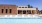 a swimming pool in front of a building