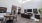 a room with a table chairs and a couch