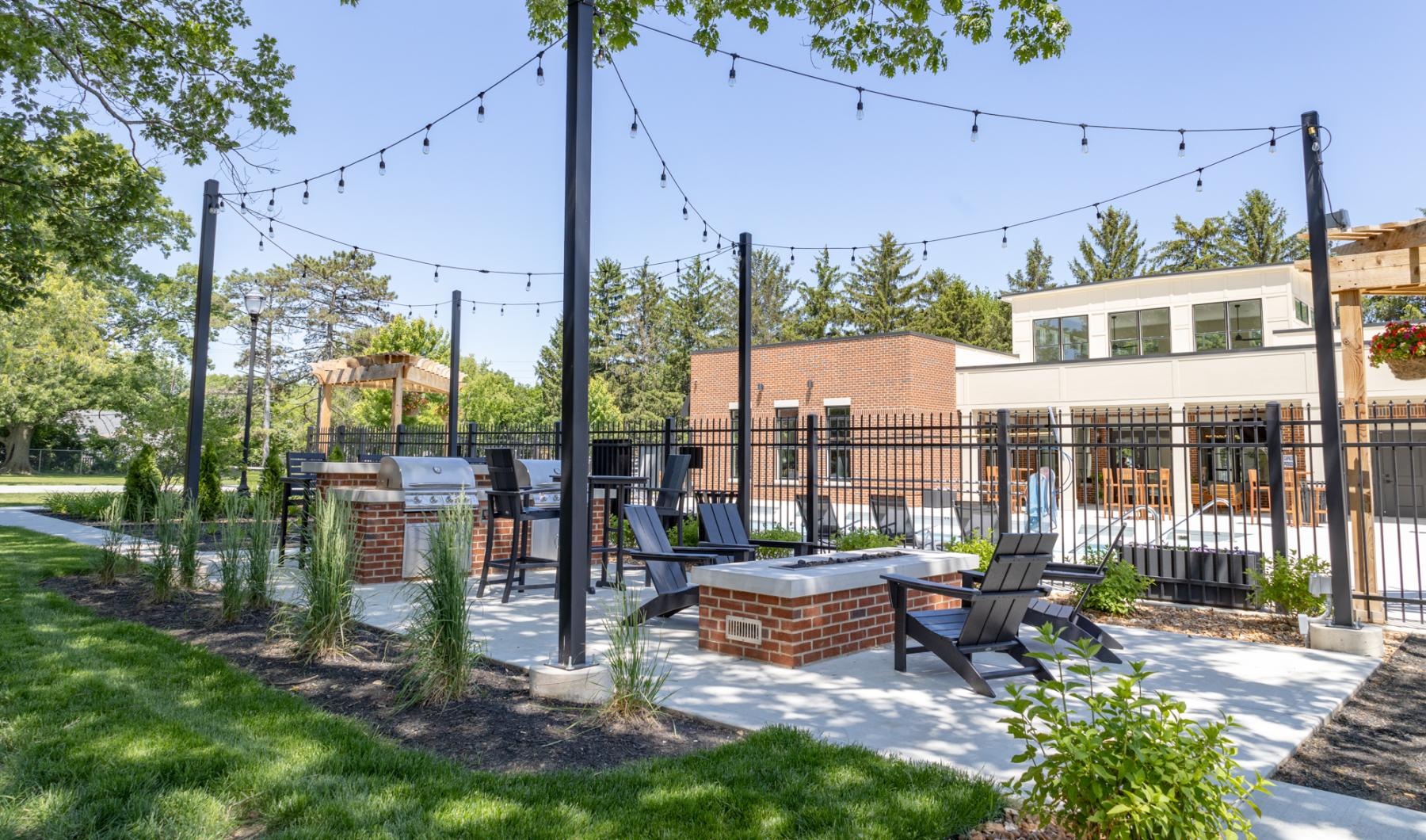 a yard with a grill